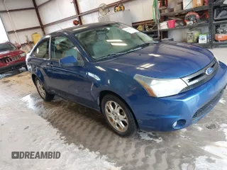 2009 Ford Focus SE with VIN 1FAHP32N09W244420, listed as a IAAI auction lot 41952030 with 165,886 mi miles. Bid and sale history available at carsss.com. Image 1.