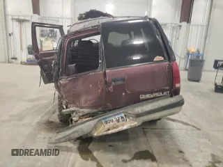 1995 Chevrolet Tahoe z VIN 1GNEK13KXSJ427631, wystawiony jako Copart lot #52624475 z przebiegiem 228 492 mil mil oraz Nie do naprawy. Historia ofert i sprzedaży dostępna na DreamBid. Obrazek 6.