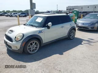 2007 MINI Hardtop S with VIN WMWMF73517TL83792, listed as a IAAI auction lot 42680017 with 135,631 mi miles and . Bid and sale history available at DreamBid. Image 2.