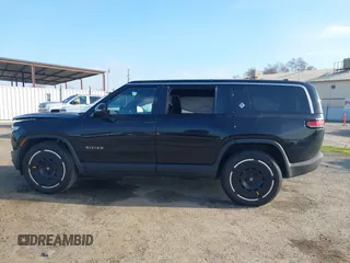 2025 Rivian R1S Adventure with VIN 7PDSGBBAXSN055849, listed as a IAAI auction lot 41255282 with 2,885 mi miles. Bid and sale history available at carsss.com. Image 15.