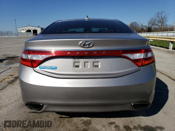 2013 Hyundai Azera с VIN KMHFG4JG8DA256908, выставлен на аукционе Copart как лот 50573915 с пробегом 146 015 миль миль и Списание • Salvage title. История ставок и продаж доступна на DreamBid. Изображение 6.