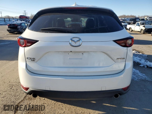 2021 Mazda CX-5 Touring with VIN JM3KFBCM9M0336910, listed as a Copart auction lot 48032275 with 65,515 mi miles and Salvage Title. Bid and sale history available at carsss.com. Image 6.