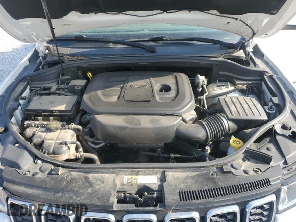 2019 Jeep Grand Cherokee Laredo E with VIN 1C4RJEAG2KC732645, listed as a Copart auction lot 53336495 with 76,221 mi miles and Salvage title. Bid and sale history available at DreamBid. Image 12.