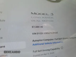 2020 Tesla Model 3 Long Range z VIN 5YJ3E1EB0LF628130, wystawiony jako Copart lot #50706955 z przebiegiem 67 384 mil mil oraz Szkoda całkowita • Salvage title. Historia ofert i sprzedaży dostępna na DreamBid. Obrazek 9.