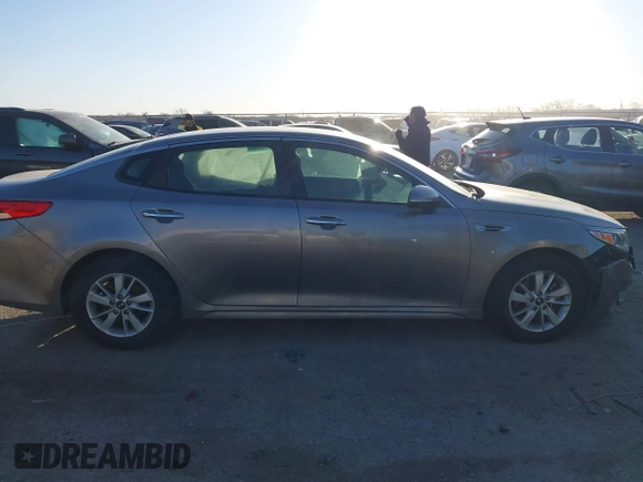 2016 Kia Optima LX with VIN 5XXGT4L39GG102599, listed as a IAAI auction lot 41748147 with 104,712 mi miles. Bid and sale history available at carsss.com. Image 13.