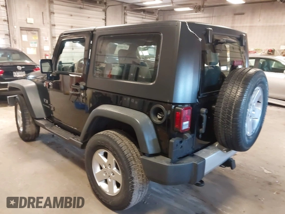 2007 Jeep Wrangler X with VIN 1J8FA24167L230763, listed as a IAAI auction lot 41876090 with 130,136 mi miles and . Bid and sale history available at carsss.com. Image 3.