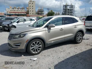 2015 Lincoln MKC z VIN 5LMTJ2AH2FUJ33637, wystawiony jako Copart lot #58086665 z przebiegiem 128 998 mil mil oraz Szkoda całkowita • Salvage title. Historia ofert i sprzedaży dostępna na DreamBid. Obrazek 1.