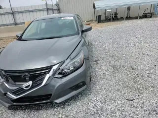 2017 Nissan Altima SR z VIN 1N4AL3AP7HC136120, wystawiony jako Copart lot #57295125 z przebiegiem 84 300 mil mil oraz Szkoda całkowita • Salvage title. Historia ofert i sprzedaży dostępna na DreamBid. Obrazek 13.