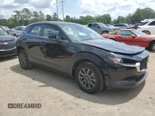 2023 Mazda CX-30 S with VIN 3MVDMBAM6PM513651, listed as a Copart auction lot 57432955 with 49,851 mi miles and Salvage title. Bid and sale history available at DreamBid. Image 4.