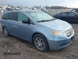 2012 Honda Odyssey EX-L with VIN 5FNRL5H60CB051959, listed as a IAAI auction lot 41967908 with Not Provided miles and . Bid and sale history available at carsss.com. Image 1.