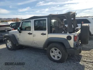 2007 Jeep Wrangler Unlimited X with VIN 1J8GB39157L142982, listed as a Copart auction lot 82050134 with 72,666 mi miles and Salvage Title. Bid and sale history available at DreamBid. Image 2.