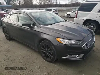 2018 Ford Fusion S z VIN 3FA6P0G70JR264965, wystawiony jako Copart lot #85553684 z przebiegiem 235 205 mil mil oraz Szkoda całkowita • Salvage title. Historia ofert i sprzedaży dostępna na DreamBid. Obrazek 11.