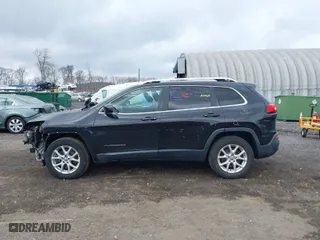 2014 Jeep Cherokee Latitude with VIN 1C4PJMCS0EW264288, listed as a IAAI auction lot 41921730 with 137,586 mi miles. Bid and sale history available at carsss.com. Image 14.