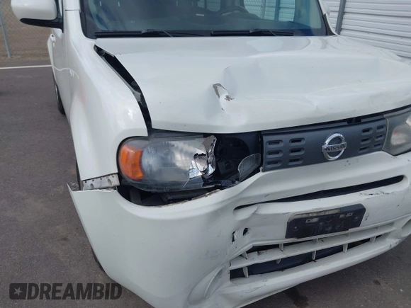 2010 Nissan Cube S z VIN JN8AZ2KRXAT161347, wystawiony jako IAAI lot #41921669 z przebiegiem 161 121 mil mil oraz . Historia ofert i sprzedaży dostępna na DreamBid. Obrazek 6.