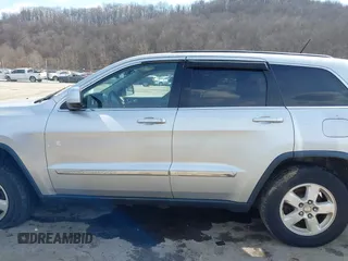 2013 Jeep Grand Cherokee Laredo with VIN 1C4RJFAG5DC634685, listed as a IAAI auction lot 41792147 with 260,594 mi miles. Bid and sale history available at carsss.com. Image 14.