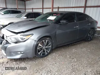 2018 Nissan Maxima Platinum z VIN 1N4AA6AP4JC390235, wystawiony jako IAAI lot #42376364 z przebiegiem 152 293 mil mil oraz . Historia ofert i sprzedaży dostępna na DreamBid. Obrazek 17.