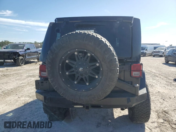 2015 Jeep Wrangler Unlimited Rubicon Hard Rock with VIN 1C4HJWFG1FL710264, listed as a Copart auction lot 47563975 with 96,737 mi miles and Salvage title. Bid and sale history available at DreamBid. Image 6.