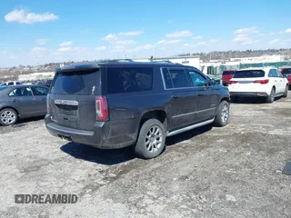 2015 GMC Yukon XL Denali with VIN 1GKS2JKJ5FR144991, listed as a IAAI auction lot 41877853 with 167,814 mi miles. Bid and sale history available at carsss.com. Image 4.