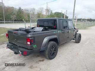 2022 Jeep Gladiator Texas Trail z VIN 1C6HJTAG0NL162804, wystawiony jako IAAI lot #41524087 z przebiegiem 17 652 mil mil oraz . Historia ofert i sprzedaży dostępna na DreamBid. Obrazek 4.