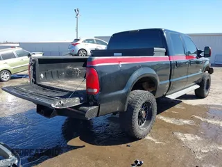 1999 Ford Super Duty F-250 XL with VIN 1FTNW21F3XEA73346, listed as a IAAI auction lot 41720350 with 193,884 mi miles. Bid and sale history available at carsss.com. Image 4.