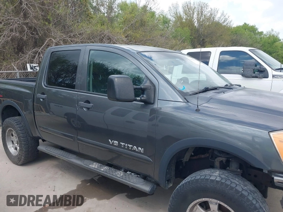 2011 Nissan Titan Pro-4X with VIN 1N6BA0EC3BN320795, listed as a IAAI auction lot 41868113 with 183,919 mi miles and . Bid and sale history available at DreamBid. Image 13.