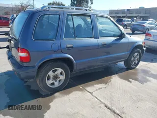 2001 Kia Sportage with VIN KNDJB723015065059, listed as a IAAI auction lot 41554856 with 170,827 mi miles. Bid and sale history available at carsss.com. Image 4.