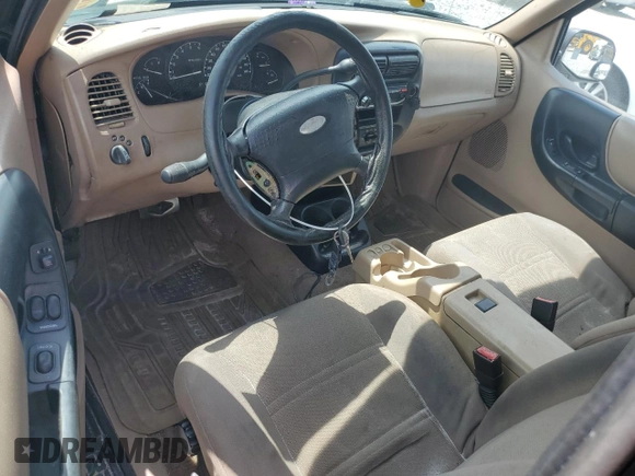 2002 Ford Ranger XLT Appearance with VIN 1FTYR44E42TA32828, listed as a Copart auction lot 60205715 with 290,846 mi miles and Salvage title. Bid and sale history available at DreamBid. Image 8.
