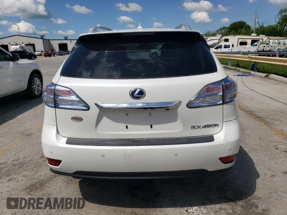 2011 Lexus RX 450h with VIN JTJBC1BA3B2420951, listed as a Copart auction lot 54869515 with 128,716 mi miles and Salvage Title. Bid and sale history available at DreamBid. Image 6.