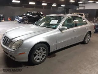 2006 Mercedes-Benz E-Class 3.5L with VIN WDBUF87J76X182677, listed as a IAAI auction lot 42016237 with 150,085 mi miles. Bid and sale history available at carsss.com. Image 2.