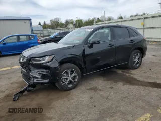 2025 Honda HR-V EX-L z VIN 3CZRZ2H73SM754322, wystawiony jako Copart lot #54138475 z przebiegiem 2 078 mil mil oraz Szkoda całkowita • Salvage title. Historia ofert i sprzedaży dostępna na DreamBid. Obrazek 1.