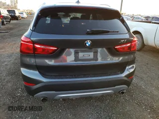 2017 BMW X1 xDrive28i with VIN WBXHT3C30H5F71865, listed as a Copart auction lot 67841122 with 75,471 mi miles. Bid and sale history available at carsss.com. Image 6.