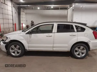 2010 Dodge Caliber SXT with VIN 1B3CB4HA3AD590654, listed as a IAAI auction lot 41814572 with 203,422 mi miles and . Bid and sale history available at DreamBid. Image 15.
