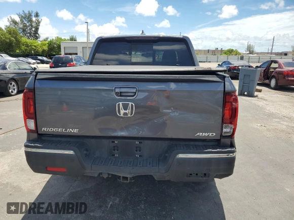 2017 Honda Ridgeline RTL-E with VIN 5FPYK3F74HB027130, listed as a Copart auction lot 60146905 with 99,964 mi miles and Salvage title. Bid and sale history available at DreamBid. Image 6.