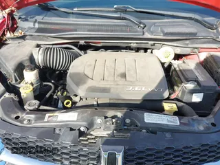 2014 Dodge Grand Caravan SXT with VIN 2C4RDGCG8ER245316, listed as a IAAI auction lot 41871425 with 150,361 mi miles and . Bid and sale history available at DreamBid. Image 10.