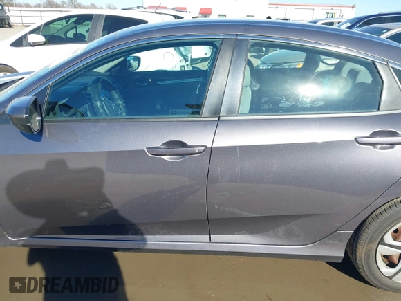 2017 Honda Civic LX z VIN 19XFC2F58HE012626, wystawiony jako IAAI lot #41458898 z przebiegiem 120 354 mil mil oraz . Historia ofert i sprzedaży dostępna na DreamBid. Obrazek 14.