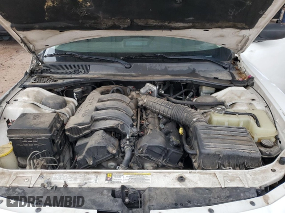 2009 Dodge Charger SE z VIN 2B3KA43D09H629621, wystawiony jako Copart lot #55808625 z przebiegiem 165 375 mil mil oraz Szkoda całkowita • Salvage title. Historia ofert i sprzedaży dostępna na DreamBid. Obrazek 11.