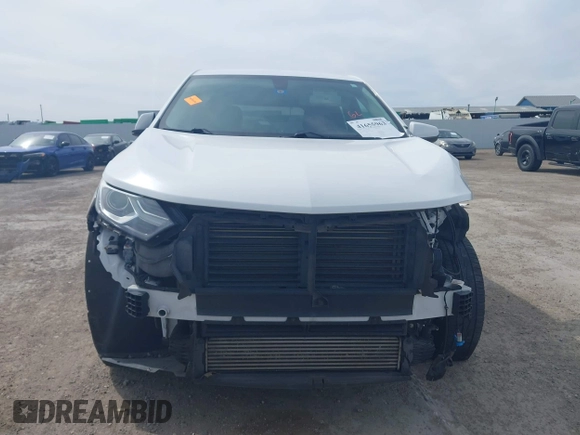 2019 Chevrolet Equinox LT z VIN 2GNAXKEVXK6256700, wystawiony jako IAAI lot #41655963 z przebiegiem 80 294 mil mil oraz . Historia ofert i sprzedaży dostępna na DreamBid. Obrazek 13.