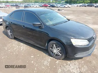 2014 Volkswagen Jetta S z VIN 3VW2K7AJ8EM375705, wystawiony jako IAAI lot #42476300 z przebiegiem 297 388 mil mil oraz . Historia ofert i sprzedaży dostępna na DreamBid. Obrazek 1.