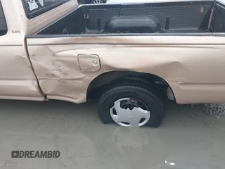 1999 Toyota Tacoma with VIN 4TAVL52N4XZ524059, listed as a IAAI auction lot 41761806 with 214,425 mi miles and . Bid and sale history available at DreamBid. Image 6.