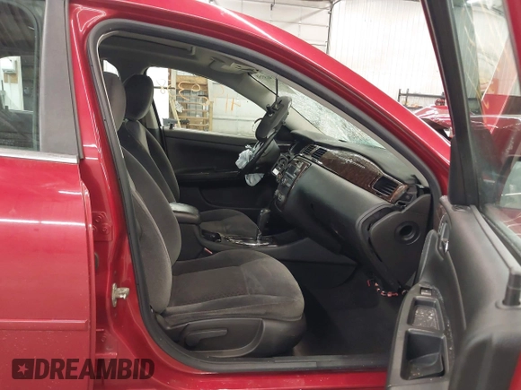 2014 Chevrolet Impala LT with VIN 2G1WB5E36E1133855, listed as a IAAI auction lot 41969358 with 148,897 mi miles and . Bid and sale history available at DreamBid. Image 5.