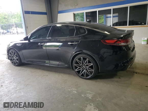 2016 Kia Optima SX Turbo with VIN 5XXGW4L23GG011780, listed as a Copart auction lot 56628295 with 104,288 mi miles and Salvage title. Bid and sale history available at DreamBid. Image 2.