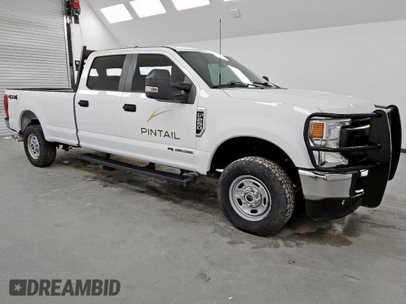 2022 Ford F-250 XL with VIN 1FT7W2BT3NEC38239, listed as a Copart auction lot 63423635 with 104,967 mi miles and Clean title. Bid and sale history available at DreamBid. Image 4.