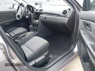 2006 Mazda 3 i with VIN JM1BK12F261420775, listed as a IAAI auction lot 42031576 with 145,530 mi miles. Bid and sale history available at carsss.com. Image 5.