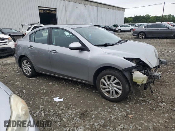 2012 Mazda 3 i Touring with VIN JM1BL1V82C1577583, listed as a Copart auction lot 58669235 with 89,872 mi miles and Salvage title. Bid and sale history available at DreamBid. Image 4.