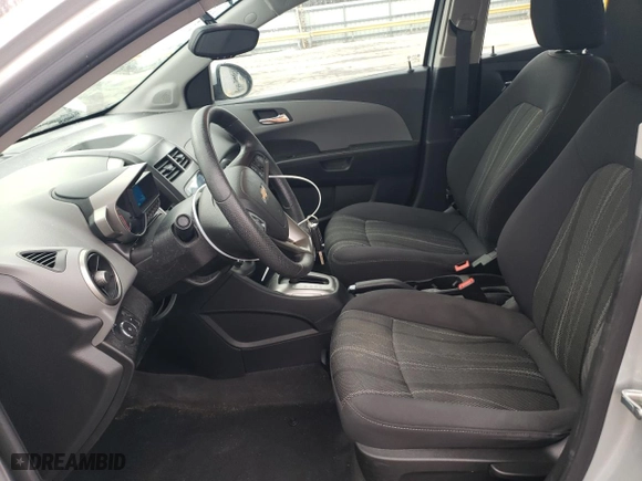 2014 Chevrolet Sonic LT with VIN 1G1JC5SHXE4143722, listed as a Copart auction lot 50823675 with 77,985 mi miles and Salvage Title. Bid and sale history available at carsss.com. Image 7.