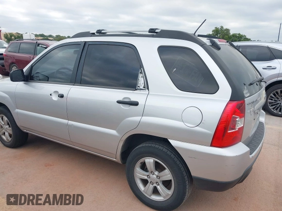 2009 Kia Sportage LX with VIN KNDJF724097567390, listed as a IAAI auction lot 42066762 with 159,946 mi miles. Bid and sale history available at carsss.com. Image 6.