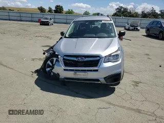 2018 Subaru Forester z VIN JF2SJABC6JH414603, wystawiony jako Copart lot #56666915 z przebiegiem 101 663 mil mil oraz Szkoda całkowita • Salvage title. Historia ofert i sprzedaży dostępna na DreamBid. Obrazek 13.