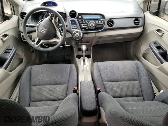 2010 Honda Insight EX with VIN JHMZE2H71AS039108, listed as a Copart auction lot 54557145 with 151,230 mi miles and Salvage title. Bid and sale history available at DreamBid. Image 8.