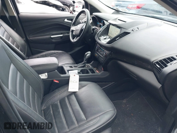 2018 Ford Escape Titanium с VIN 1FMCU9J99JUA14598, выставлен на аукционе IAAI как лот 41859368 с пробегом 59 438 миль миль и . История ставок и продаж доступна на DreamBid. Изображение 5.