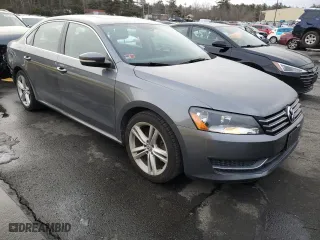 2014 Volkswagen Passat SE with VIN 1VWBP7A38EC018710, listed as a Copart auction lot 42289915 with 100,595 mi miles and Salvage Title. Bid and sale history available at carsss.com. Image 4.